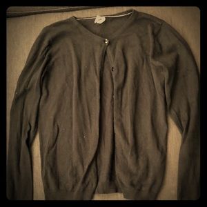 A black cardigan with a button up